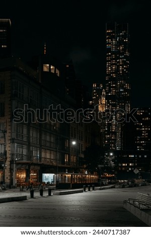 New York City Nightscape with Glowing Skyscrapers and Empty Streets