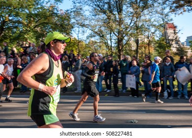 NEW YORK CITY - NOV 11: New York City Marathon Runners Run Through A Water Station On November 11, 2011. The Marathon Is One Of The World Marathon Majors.