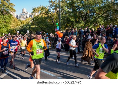 NEW YORK CITY - NOV 11: New York City Marathon Runners Run Through A Water Station On November 11, 2011. The Marathon Is One Of The World Marathon Majors.