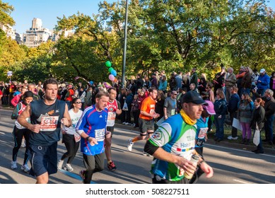 NEW YORK CITY - NOV 11: New York City Marathon Runners Run Through A Water Station On November 11, 2011. The Marathon Is One Of The World Marathon Majors.