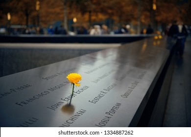 NEW YORK CITY - NOV 12: September 11 memorial with rose on November 12, 2014 in Manhattan, New York City. With population of 8.4M, it is the most populous city in the United States.