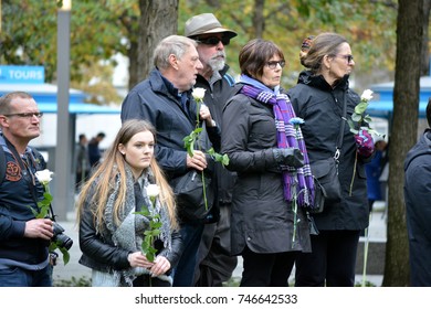 New York City - November 1, 2017: Family Taking Part In A Moment Of Silence In Lower Manhattan To Honor Those Killed In The Terrorist Truck Attack In Tribeca The Day Before.