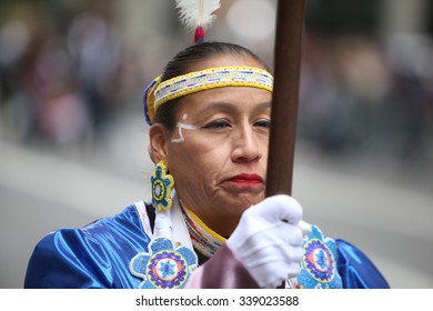 NEW YORK CITY - NOVEMBER 11 2015: The City's Annual Veteran's Day Parade Was Led By The US Navy & Grand Marshal & Navy Veteran Robert Morgenthau. Marcher In Native American Costume