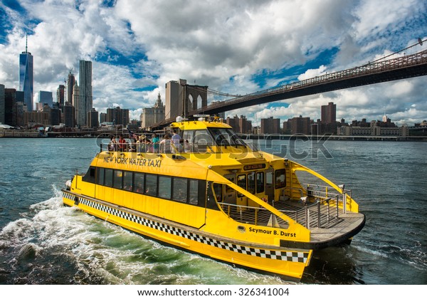NEW YORK\
CITY, NOVEMBER 19: The New York Water Taxi on the route on August\
20th, 2015 on the Hudson River. New York Water Taxi offer taxi\
services on the East and Hudson\
rivers.
