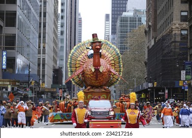 NEW YORK CITY - NOVEMBER 27 2014: the 88th annual Macy's Thanksgiving Day parade stretched from Manhattan's Upper West Side to Herald Square, viewed by 350,000 spectators. Tom Turkey float