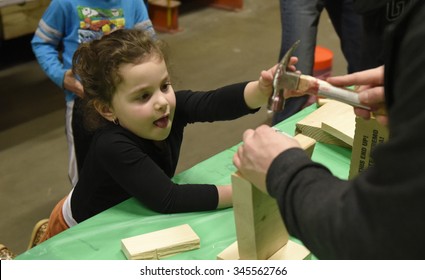 NEW YORK CITY - NOVEMBER 29 2015: Friendship Circle Of Brooklyn Held Its Annual Craft Fare For Special Needs Students At Home Depot  This Year Building Menorahs For Hanukkah.