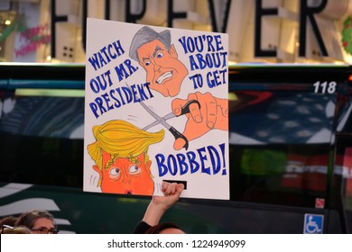 New York City - November, 8, 2018: Protesters gathered in Times Square over President Trump's firing of Attorney General Jeff Sessions and to support special counsel Robert Mueller.