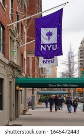 NEW YORK CITY, NY -1 FEB 2020- View of a purple school flag on the campus on New York University (NYU) in Manhattan, New York City, United States.
