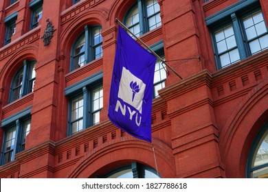 NEW YORK CITY, NY -27 SEP 2020- View of a purple school flag on the campus on New York University (NYU) in Manhattan, New York City, United States.