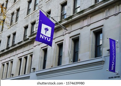 NEW YORK CITY, NY -3 NOV 2019- View of a purple school flag on the campus on New York University (NYU) in New York City.