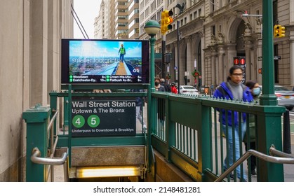 NEW YORK CITY, NY - December 28, 2021: View From Wall Street Station Subway Entrance On Broadway.