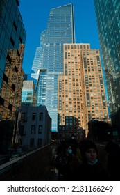 New York City, NY: February 20,2022: People And Tourists Pack And Enjoying View From Of Sky Scrapers From High Line Park Of Hudson Yards, New York City, USA