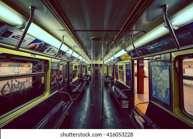 NEW YORK CITY, NY -  JANUARY 01, 2016: Vintage image of an empty subway wagon with black seats.  The subway of New York City is one of the oldest public transportation systems in the world.