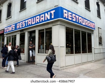 New York City, NY - June 20, 2014: Toms Restaurant location setting of famous TV sitcom Seinfeld on NBC called Monks Coffee Shop in show. Fictional characters meeting place. Tourists visit real eatery