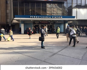 New York City, NY - March 30, 2016: Commuters and travelers enter Penn Station railroad terminal for Amtrak, New Jersey Transit and Long Island Railroad departing trains