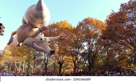 NEW YORK CITY, NY - NOVEMBER 23: Scrat from Ice Age Movie balloon flying down city streets during Macy's Thanksgiving Day Parade on November 23, 2018, in New York City, New York.