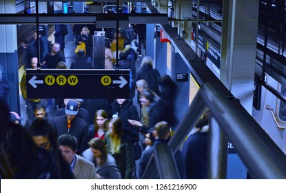 New York City, NY/ USA- 12-14-18: NY Subway People In Crowded Busy Subway Station Underground Train