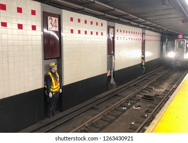 New York City, NY/ USA- 12-19-18: NYC Subway Worker On Train Tracks MTA Repair Job
