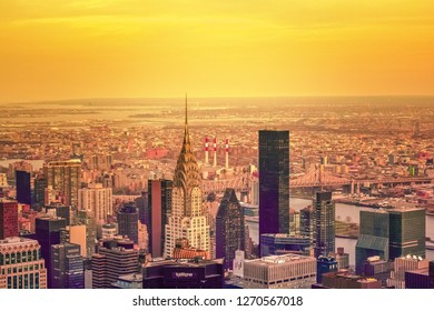 New York City, NY, USA - 121217:
A wonderful aerial view over the colourful Manhattan skyline. Buildings of all shapes and sizes rising out of the ground to create an amazing depth of field. - Shutterstock ID 1270567018