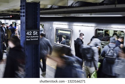 New York City, NY/ USA: 10-30-2018- NYC Port Authority Subway Station Busy People Taking Train City Lifestyle