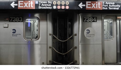 New York City, NY/ USA: 11-21-18- NYC Times Square And Port Authority Subway Terminal Billboard Sign Train Station MTA Subway Car