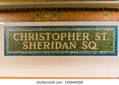 New York City, NY, USA 6/25/19 - Christopher St And Sheridan Square Subway Station Sign.  The Stonewall Inn Riots Happened Above This Subway Station And Affected LGBTQ+ Civil Rights. Greenwich Village