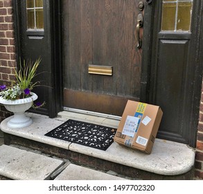 New York City, NY/ USA: 8-19-19- Amazon Shipping Package Home Delivery Box Doorstep
