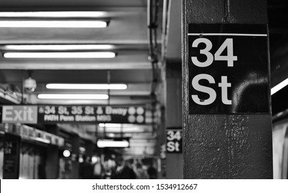 New York City, NY/ USA- 10-08-19: Black And White Subway NYC MTA Crowded Train Station Platform