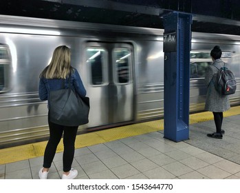 New York City, NY/ USA- 10-23-19: New York MTA Subway People Crowded Train Station