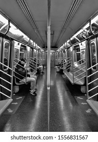 New York City, NY/ USA- 10-31-19: New York City Subway MTA People Commuting On The Train To Work