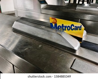 New York City, NY/ USA- 12-09-19: Metrocard MTA New York City Swiping Metro Card On Subway Turnstile