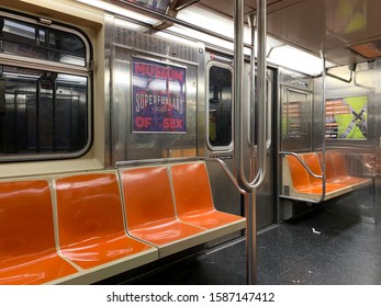 New York City, NY USA- December 2019: Inside Of Subway Wagon. Colorful Seats And Inside Of Empty Car. The NYC Subway Is One Of The Oldest And Most Extensive Public Transportation Systems In The World.