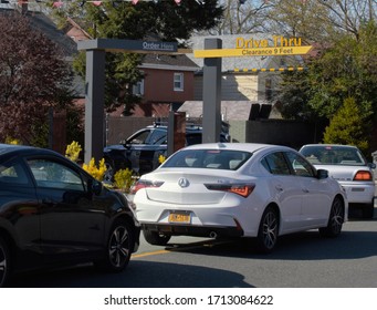 New York City, NY/ USA- 4-22-20: McDonald's Drive Thru Line People Ordering Food