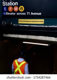 New York City, NY/ USA- 6-11-20: MTA Worker Entering New York Subway Station With Sign 
