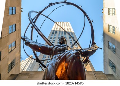 New York City, NY, USA - Dec 25th 2014: Statue of Ancient Greek Titan Atlas Holding up the Celestial Heavens on his Shoulders. Bronze Statue in Rockefeller Center, Manhattan, NYC
