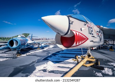 New York City, NY, USA - February 14th 2022: During The Cold War Defected MiG 17 Side-by-side An American F-8 Corsair On The Flight Deck Of USS Intrepid Sea, Air And Space Museum In NYC, NY, USA