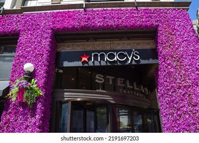 New York City, NY, USA May 1 2022: Macy's Storefront And Stella Trattoria Sign With Colorful Flowers In Herald Square Manhattan. This Is A Popular Department Store For Shopping On West 34th Street.