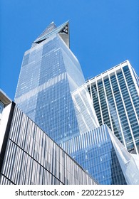 New York City, NY, USA - September 14, 2022: The Edge And Buildings At Hudson Yards, Seen From Below, Against Clear Blue Sky. 