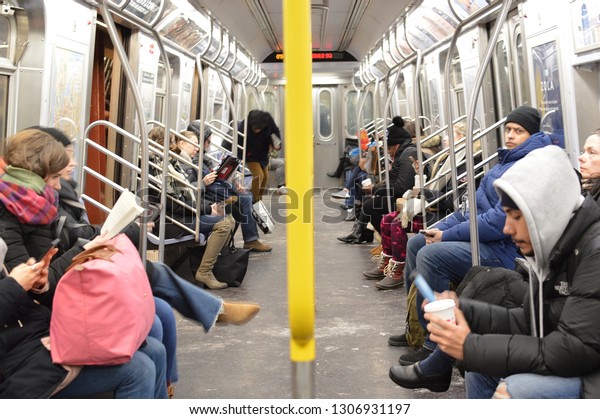 New York City, NY/\
USA: 2-01-19- New York Subway Train to Work People Riding Metro MTA\
Commuting in the City