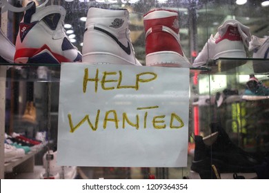 New York City, NY/USA- September 1, 2016: A Help Wanted Sign Posted On The Window Of A Store In New York City On September 1, 2016. 