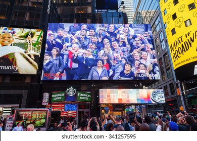 NEW YORK CITY - OCTOBER 06, 2015: big screen at Times Square with unidentified people. It is one of the worlds busiest pedestrian intersections and a major center of worlds entertainment industry