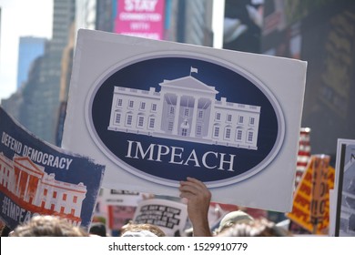 New York City, October 13, 2019: Rally calling for impeachment proceedings against President Trump in Times Square in Midtown Manhattan. 