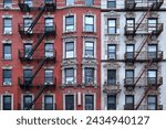 New York City ornate old apartment buildings with external fire ladders