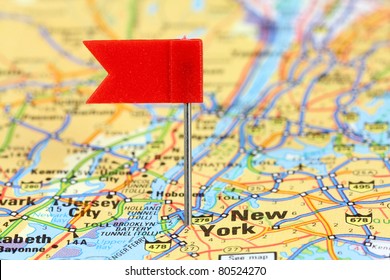 New York City. Red Flag Pin On An Old Map Showing Travel Destination.