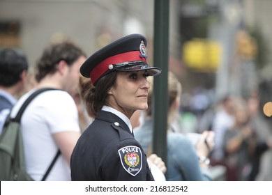 NEW YORK CITY - SEPTEMBER 11 2013: The 13th Anniversary Of The WTC Terror Attacks Was Observed In Lower Manhattan By First Responders & Relatives Of Attack Victims. Canadian Police Officer