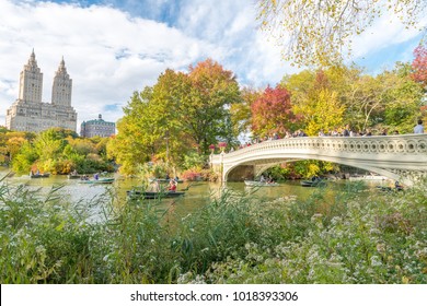 NEW YORK CITY - SEPTEMBER 2015: Tourists enjoy Central Park in autumn. New York attracts 50 million people annually. - Shutterstock ID 1018393306