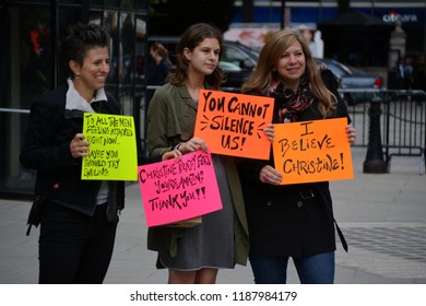 New York City - September 24, 2018: People at a rally supporting Dr. Blasey Ford and victims of sexual assault at City Hall in Lower Manhattan.