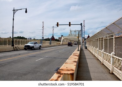 NEW YORK CITY - SEPTEMBER 27, 2016: Cars Driving On Macombs Dam Bridge Connecting Manhattan And The Bronx Over Harlem River