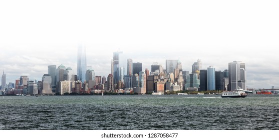 New York City skyline in fog w the Freedom tower - Shutterstock ID 1287058477