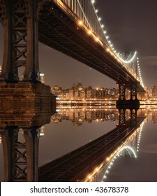 New York City Skyline And Manhattan Bridge At Night